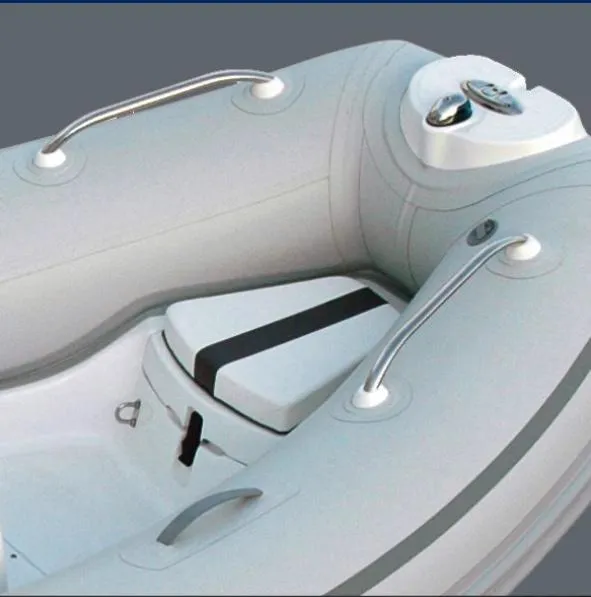 Slide: The Image of 2024 AB Inflatables Oceanus 12 VST boat interior with seating and steering console. - 12