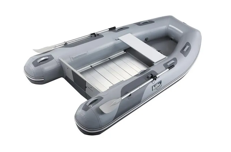 The Image of 2024 Achilles SPD-330E inflatable boat with oars and aluminum floor. - 1