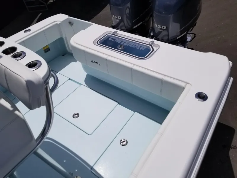 Slide: The Image of 2024 Contender 25 Tournament boat with dual 150 horsepower engines. - 11