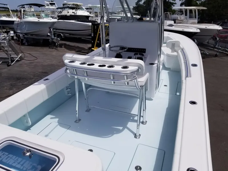 Slide: The Image of 2024 Contender 25 Tournament boat interior with seating and rod holders. - 6