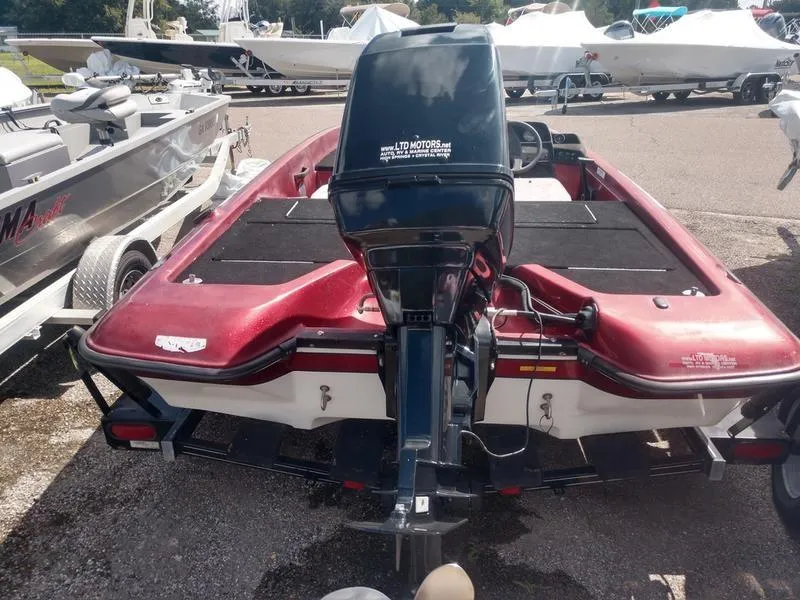 Slide: The Image of 1998 ProCraft 17 Bass boat with outboard motor, rear view. - 4
