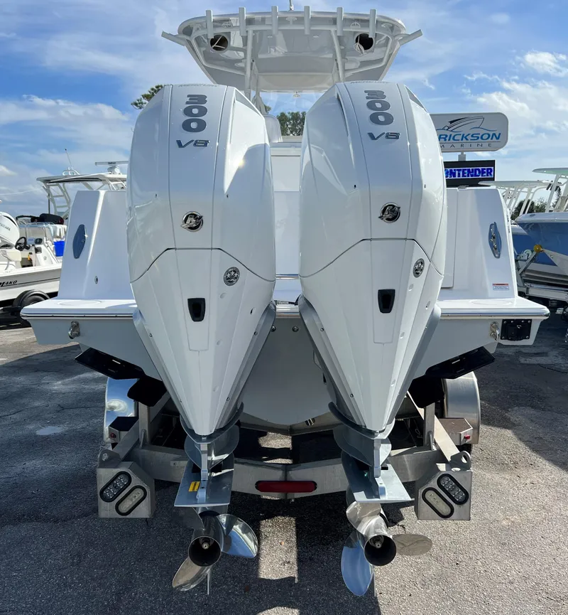 Slide: The Image of 2024 Contender 32 ST with twin 300 V8 engines, rear view. - 5