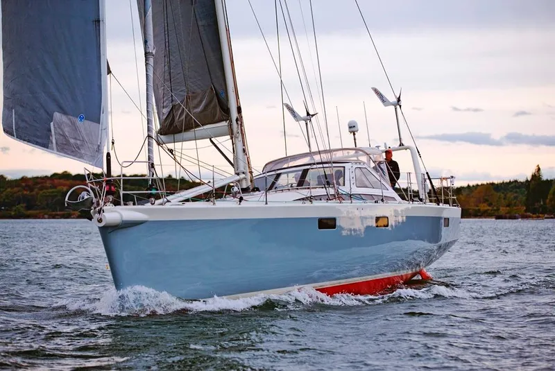 Slide: The Image of 2026 Lyman Morse Farr Racer-Cruiser sailboat navigating open waters. - 3