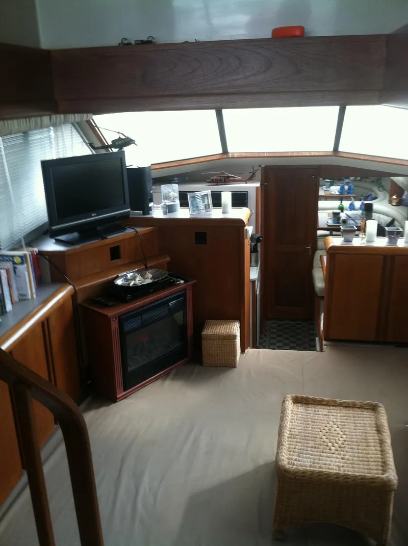 Slide: The Image of Interior of 1989 Californian 48 Motor Yacht with cozy living area and modern amenities. - 24