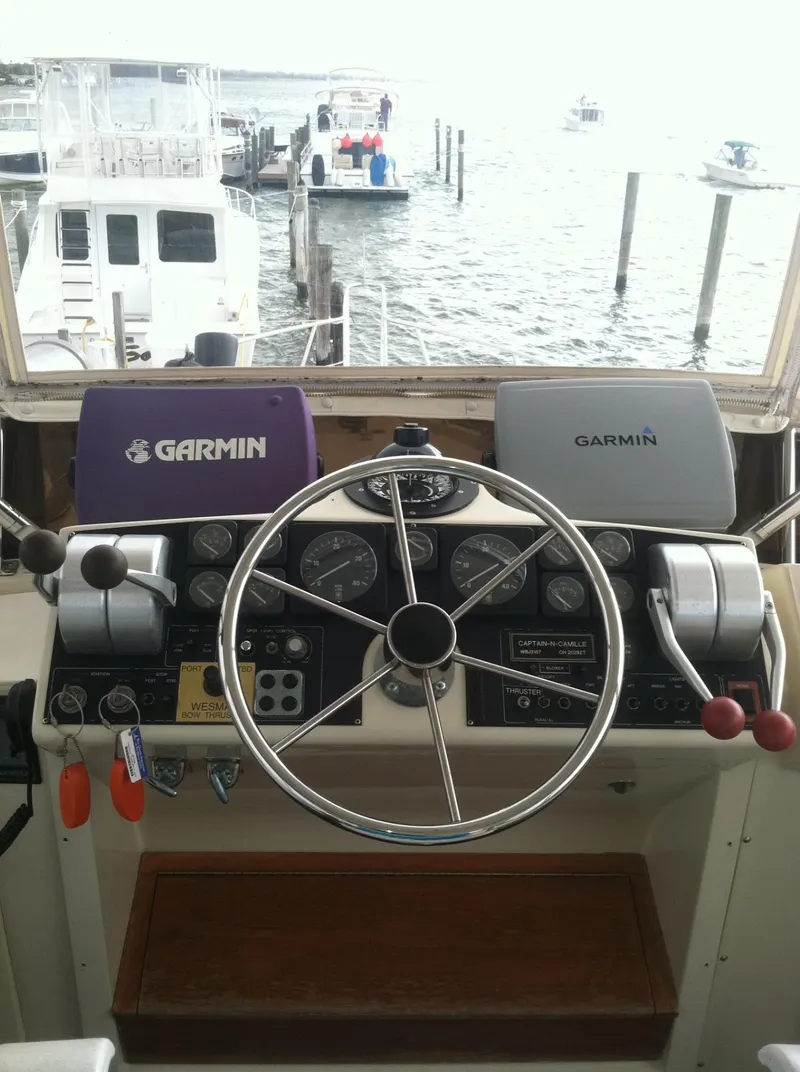Slide: The Image of Helm of 1989 Californian 48 Motor Yacht with Garmin navigation systems. - 32