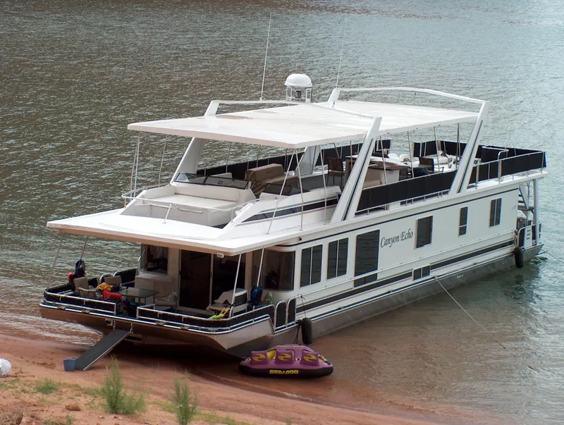 The Image of 2005 Stardust Cruisers Multi Owner Houseboat docked on a lake shore. - 0