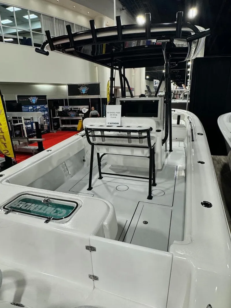 Slide: The Image of 2025 Contender 28S boat interior with sleek design and modern features on display. - 6