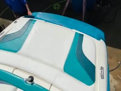 Slide: The Image of 1996 Maxum 2100SS Ski boat with teal and white upholstery. - 4