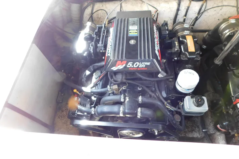Slide: The Image of Engine compartment of 2002 Rinker Fiesta Vee 310 with 5.0L EFI engine. - 63