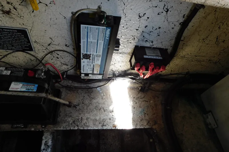 Slide: The Image of Electrical components in a 2002 Rinker Fiesta Vee 310 boat engine compartment. - 66