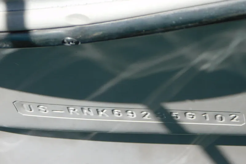 Slide: The Image of Hull identification number on 2002 Rinker Fiesta Vee 310 boat. - 79
