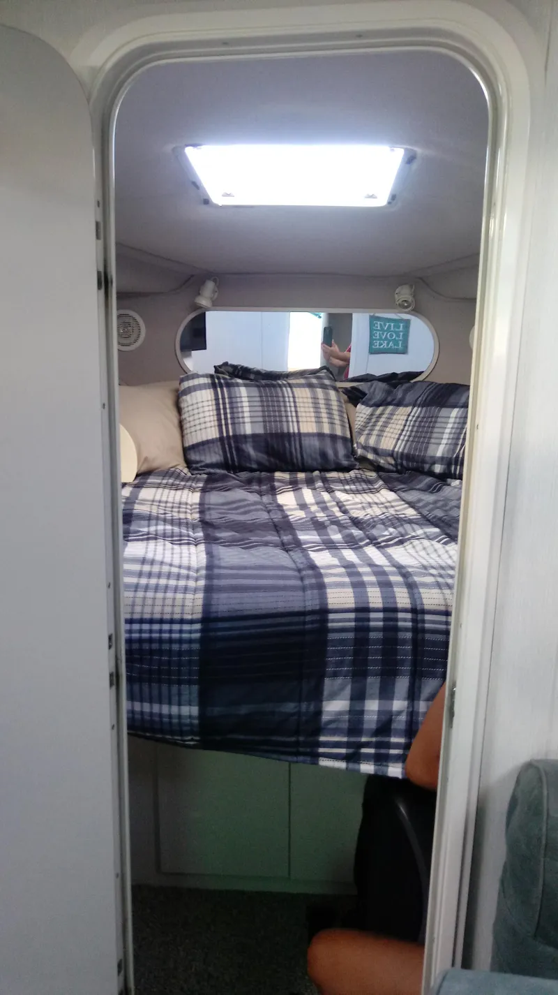 Slide: The Image of Bathroom in 1994 Cruisers Yachts 3672 Express with starfish shower curtain. - 10