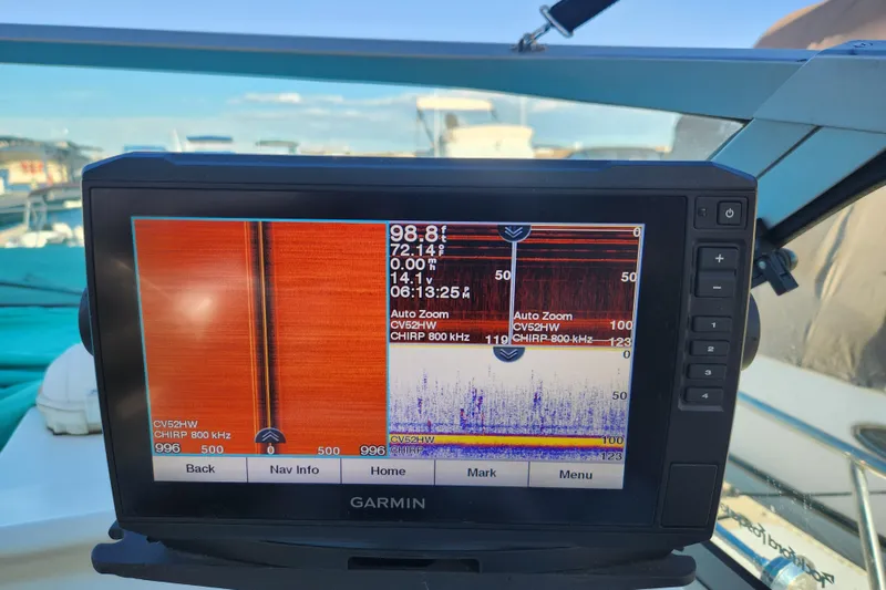 Slide: The Image of People enjoying a night on a 1994 Cruisers Yachts 3675 Esprit, illuminated by blue lights. - 26