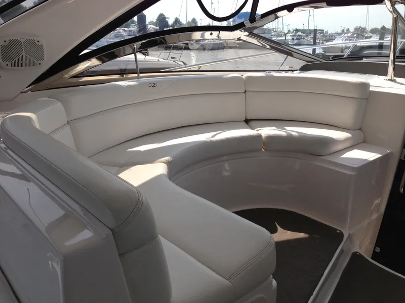 Slide: The Image of 2008 Regal Commodore 4460 yacht interior with white leather seating. - 14