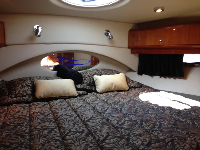 Slide: The Image of Luxurious cabin interior of 2008 Regal Commodore 4460 yacht with elegant bedding. - 29