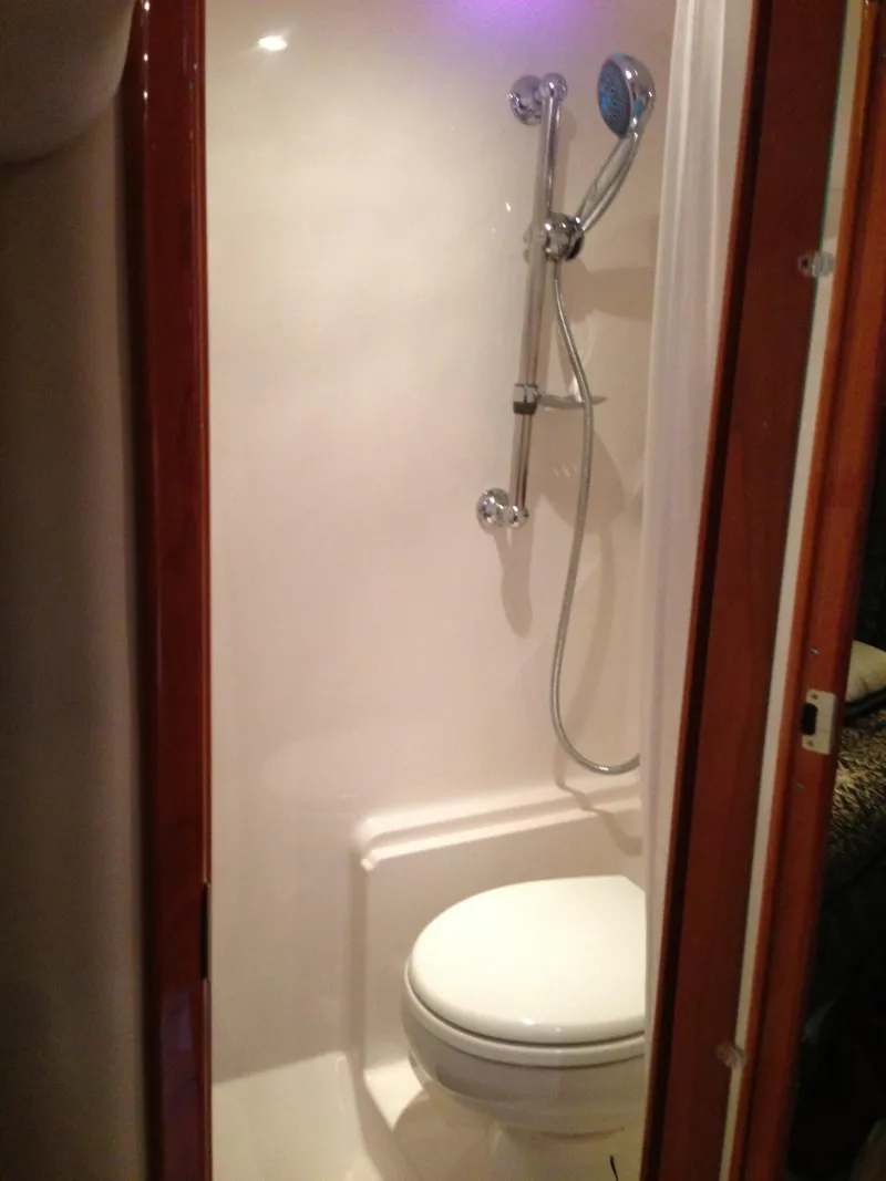 Slide: The Image of 2008 Regal Commodore 4460 yacht bathroom with shower and toilet. - 36