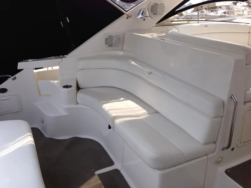 Slide: The Image of 2008 Regal Commodore 4460 yacht interior with white leather seating and modern design. - 9
