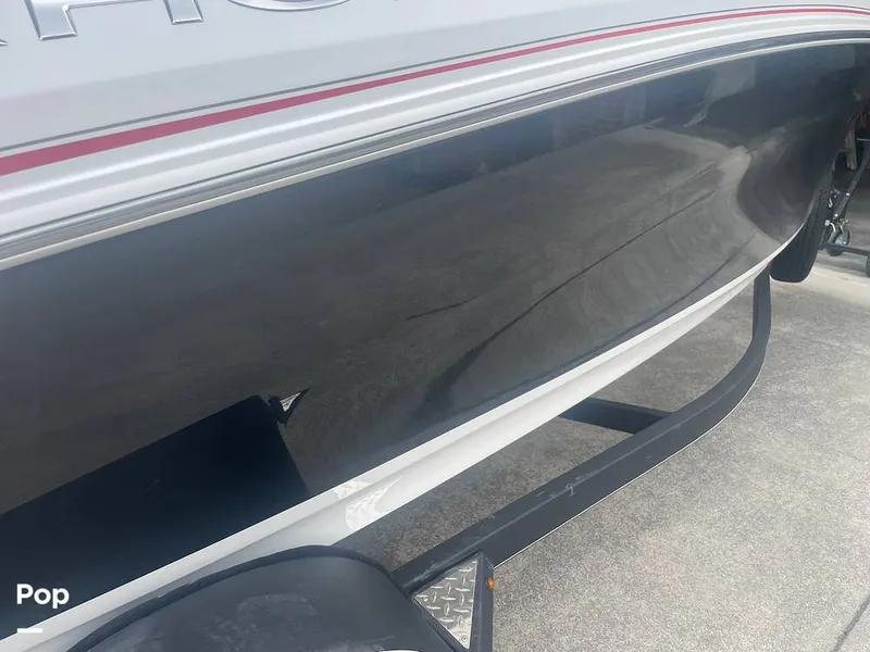 Slide: The Image of Reflection Of Trailer In Black Hull. - 15294630