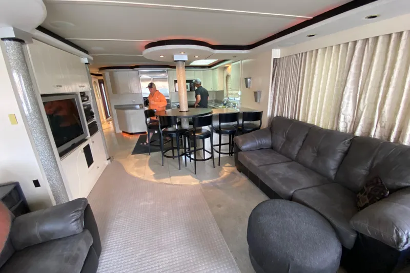 Slide: The Image of Luxurious 2000 Navigator Showboat interior with modern kitchen and comfortable seating area. - 9