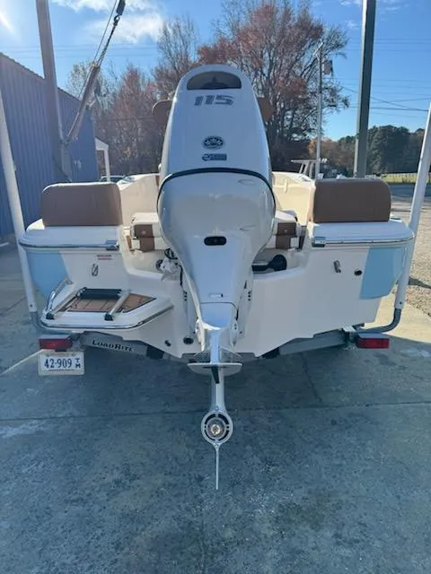 Slide: The Image of 2025 Pioneer 180 Islander boat with 115 HP engine, rear view. - 8