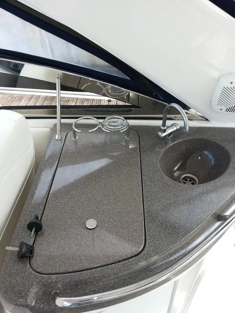 Slide: The Image of 2007 Regal Commodore 4060 yacht kitchenette with sink and countertop. - 18
