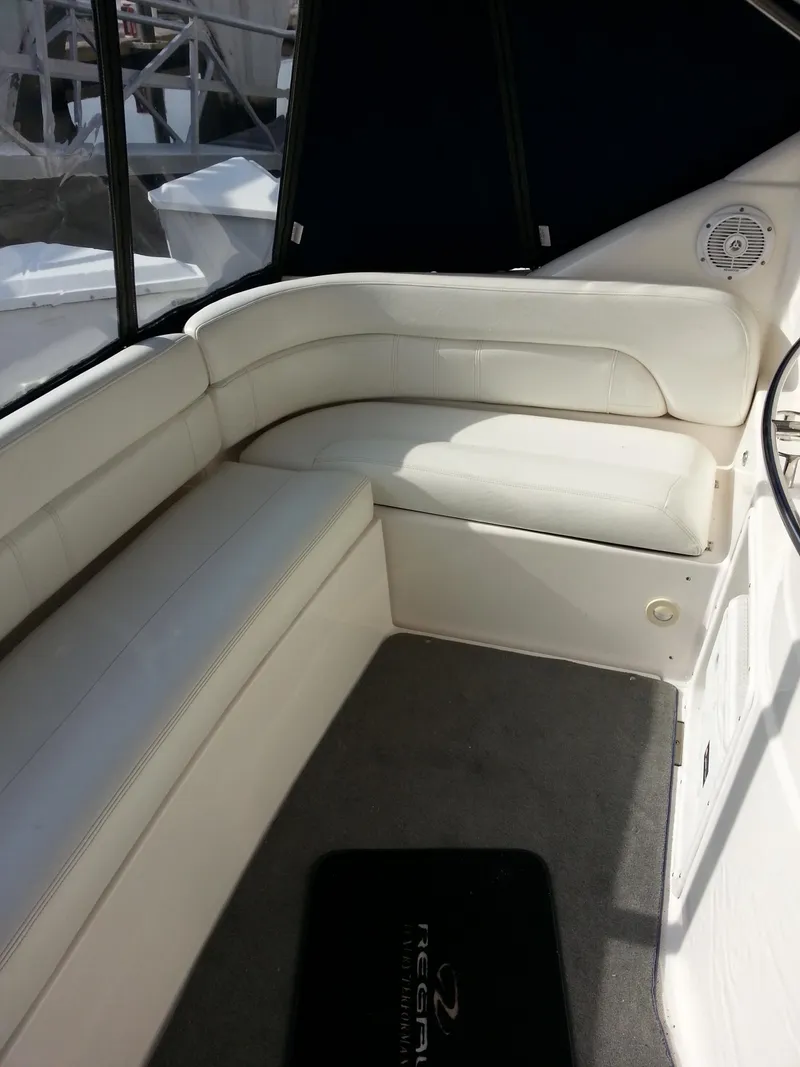 Slide: The Image of 2007 Regal Commodore 4060 interior with white seating and carpeted floor. - 40