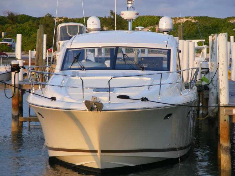 Slide: The Image of Front view of a 2012 Prestige 440S yacht docked at a marina. - 19