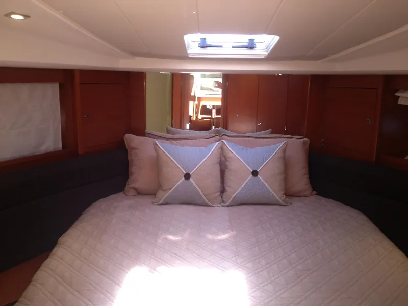 Slide: The Image of Luxurious cabin interior of 2012 Prestige 440S yacht with elegant bedding and cushions. - 31