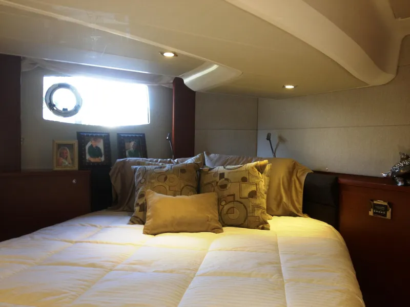 Slide: The Image of Luxurious cabin interior of 2012 Prestige 440S yacht with cozy bedding and decor. - 35