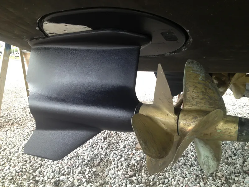 Slide: The Image of Propeller and rudder of a 2012 Prestige 440S boat on gravel surface. - 37