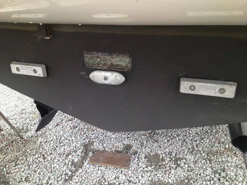 Slide: The Image of 2012 Prestige 440S boat hull with anodes on gravel surface. - 39