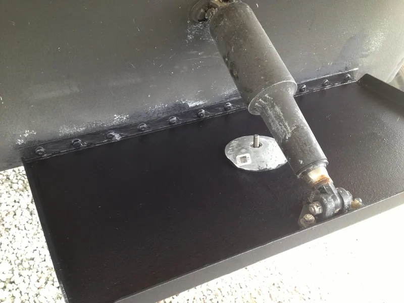 Slide: The Image of Close-up of a 2012 Prestige 440S boat component, featuring a metal bracket and joint. - 40