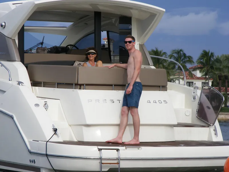 Slide: The Image of Man and woman enjoying on a 2012 Prestige 440S yacht. - 9
