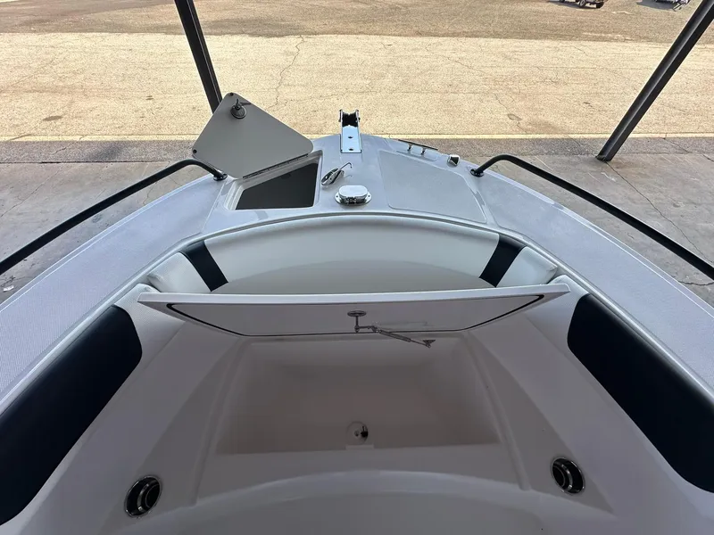 Slide: The Image of Interior storage of 2025 Edgewater 208CC Center Console boat with equipment boxes. - 17