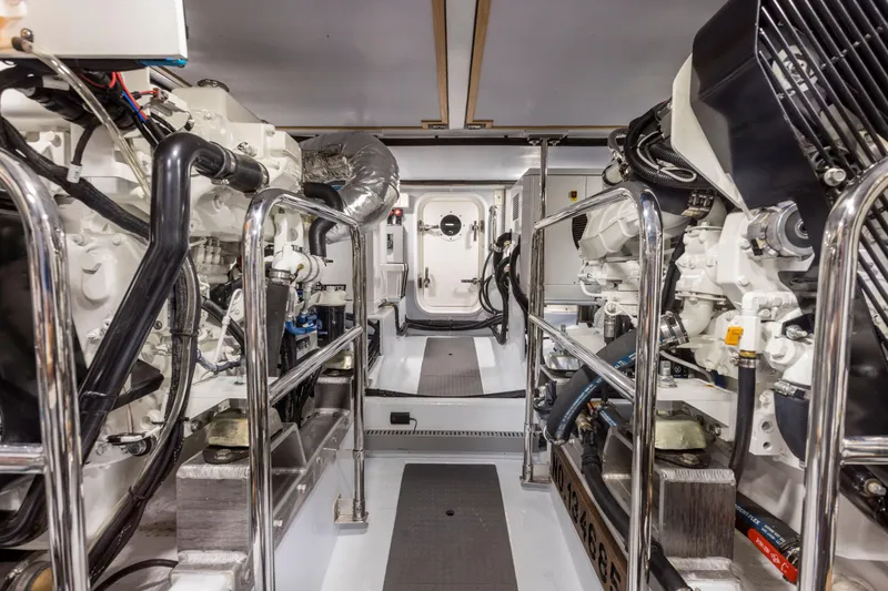 Slide: The Image of Engine room of 2026 Krogen 58 Extended Bridge yacht, featuring advanced machinery and equipment. - 13