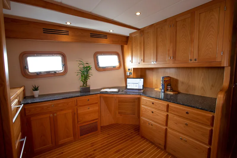 Slide: The Image of Luxurious wooden interior of 2025 Krogen 58 Extended Bridge yacht with modern amenities. - 30