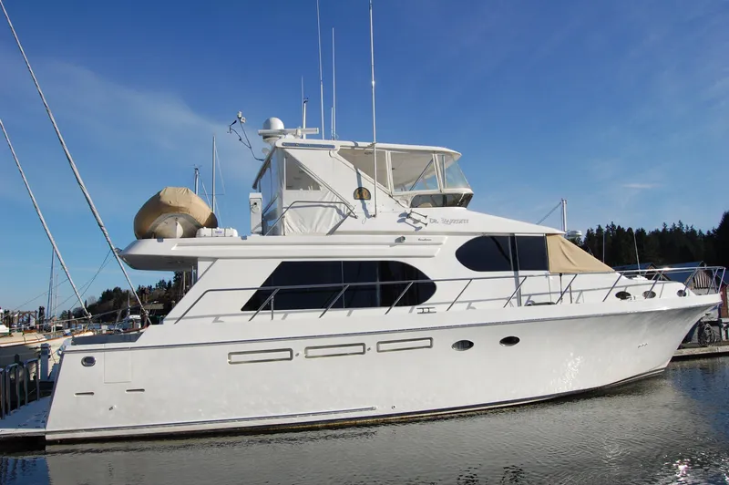 The Image of 2004 Ocean Alexander 548 Pilothouse yacht docked in marina. - 0