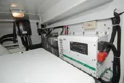 Slide: The Image of Engine room of a 2004 Ocean Alexander 548 Pilothouse yacht with electrical equipment. - 20