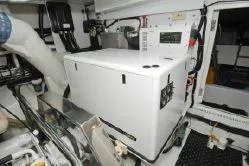 Slide: The Image of Engine room of 2004 Ocean Alexander 548 Pilothouse yacht with generator. - 21