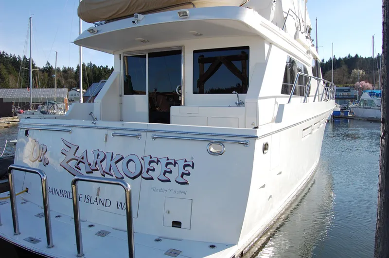 Slide: The Image of Ocean Alexander 548 Pilothouse 2004 yacht docked at marina, rear view with name Dr. Zarkoffe. - 29