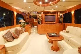 Slide: The Image of Luxurious interior of a 2004 Ocean Alexander 548 Pilothouse yacht with elegant furnishings. - 6
