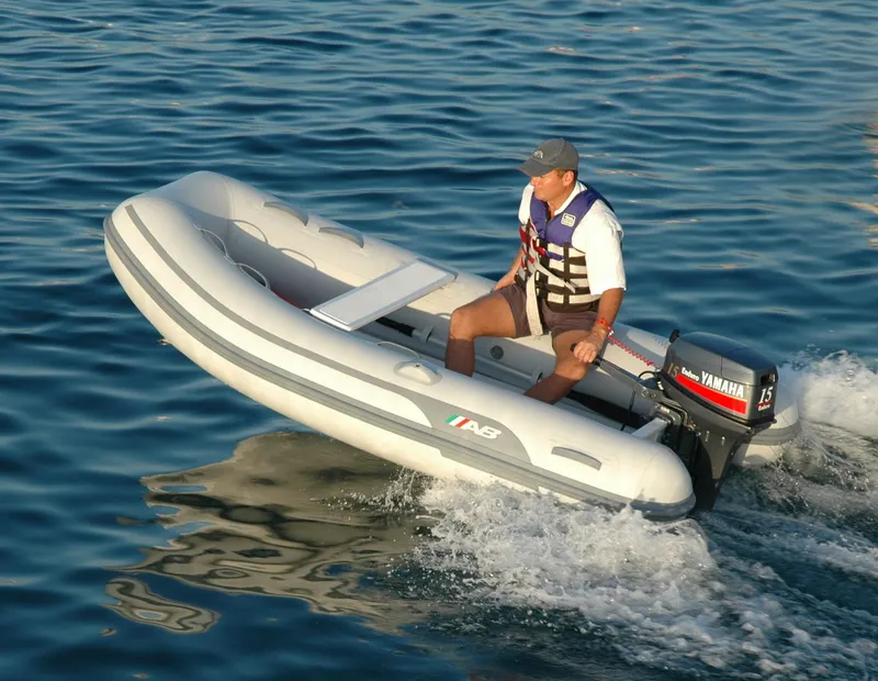 Slide: The Image of 2024 AB Inflatables Lammina 9 AL boat on water with Yamaha outboard motor. - 3