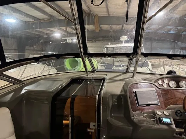 Slide: The Image of 2008 Regal 3760 boat interior with navigation equipment in a storage facility. - 19
