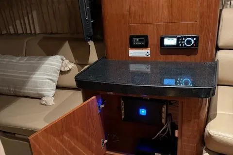 Slide: The Image of 2008 Regal 3760 interior, featuring a control panel and seating area. - 33