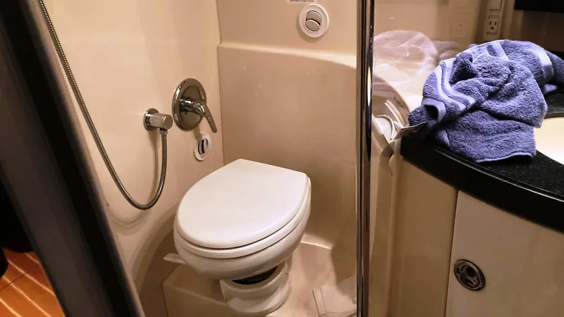 Slide: The Image of 2008 Regal 3760 boat bathroom with toilet and shower - 40