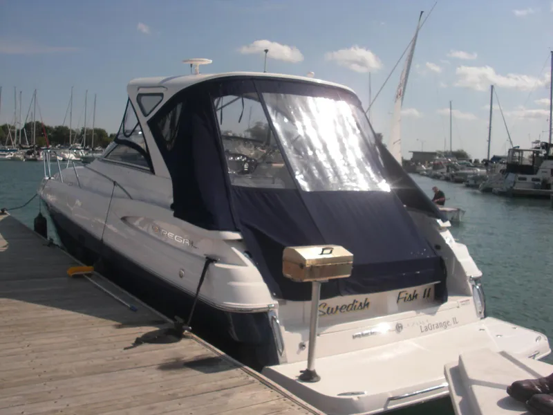 Slide: The Image of 2008 Regal 3760 yacht docked at marina on sunny day. - 7
