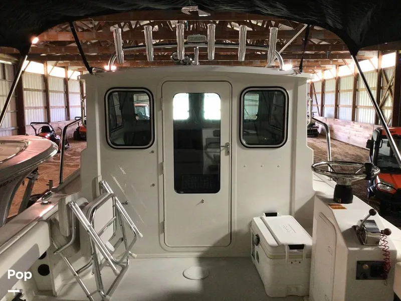 Slide: The Image of Parker Marine 2320 SL Sport Cabin 2021 - 15736973