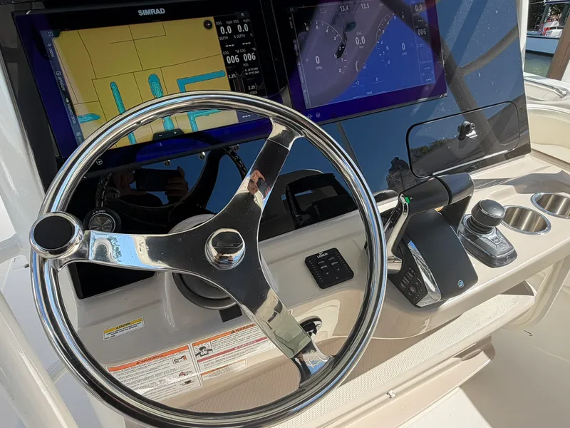 Slide: The Image of Boston Whaler 330 OUTRAGE 2024 - 25