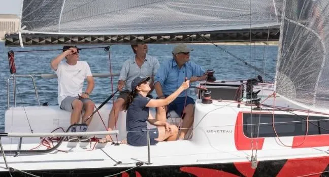 Slide: The Image of People sailing on a 2026 Beneteau First 24 yacht. - 4