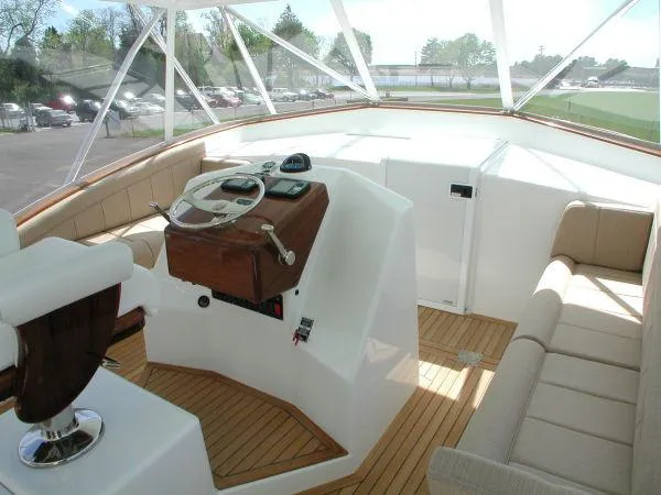 Slide: The Image of Interior of 2024 Jersey Cape Devil 36 Custom yacht with helm station and seating. - 12
